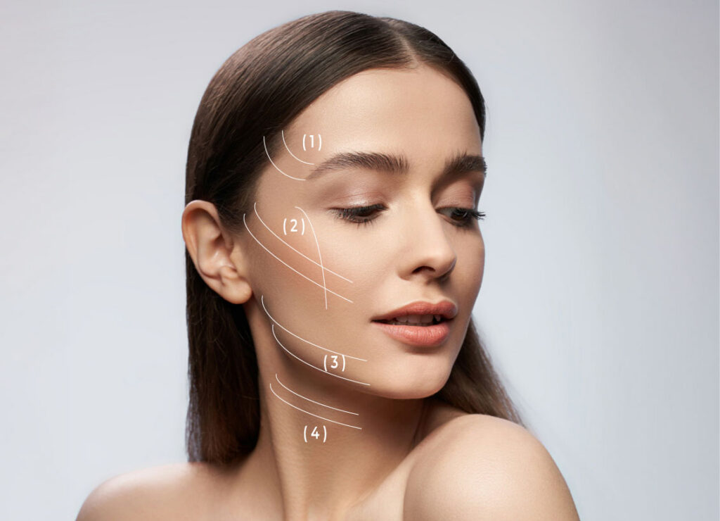 Frau mit langen glatten Haaren und freiem Oberkörper vor hellem Hintergrund mit eingezeichneten Linien am Halsbereich